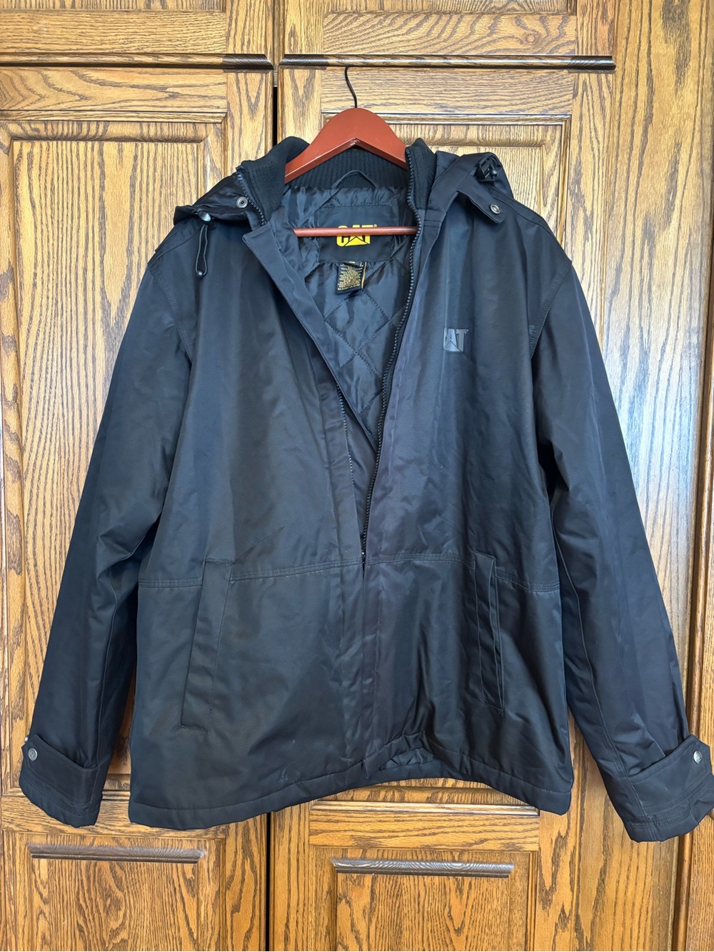 CAT Quilted Black Jacket with Yellow Logo new without tags size medium
